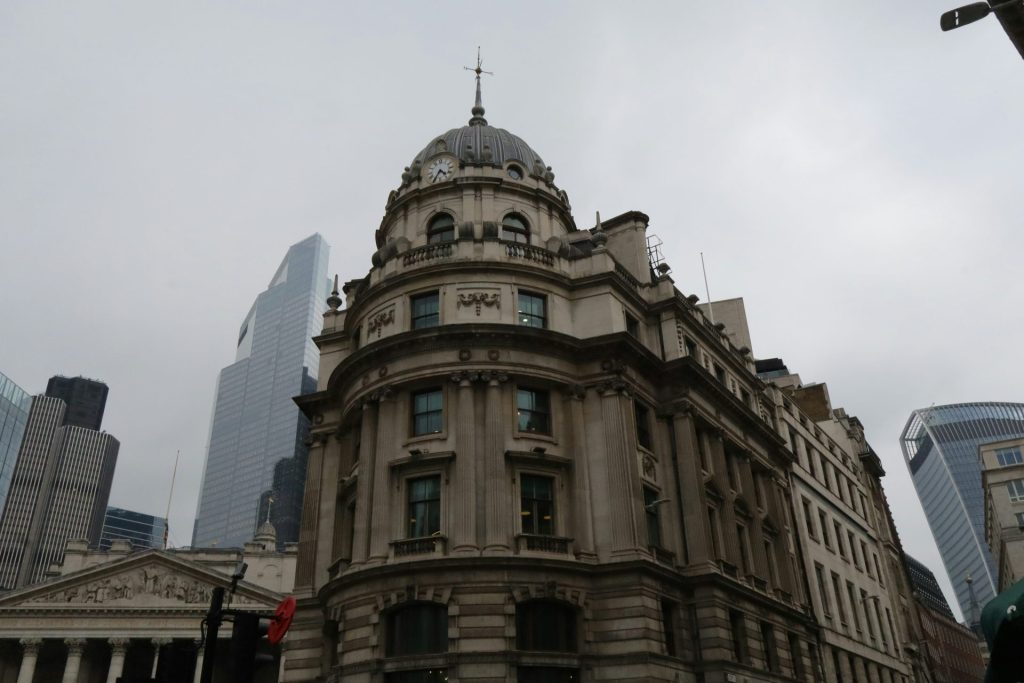 a large building with a clock on the top of it